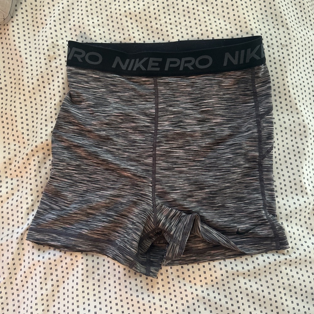 nike pros can fit medium and small :)